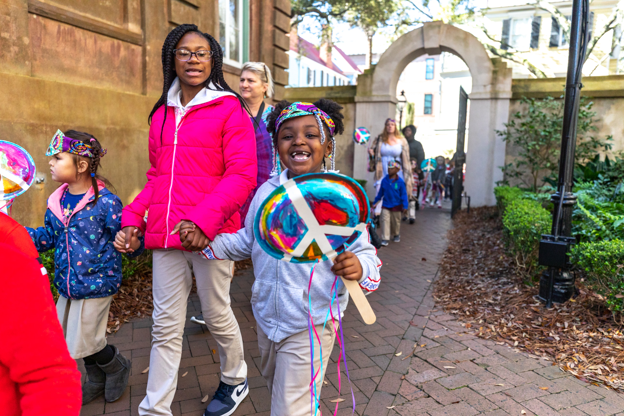 The students of ECDC walked through the College of Charleston Campus promoting peace and holding up signs of peace in the 2020 Peace Parade.