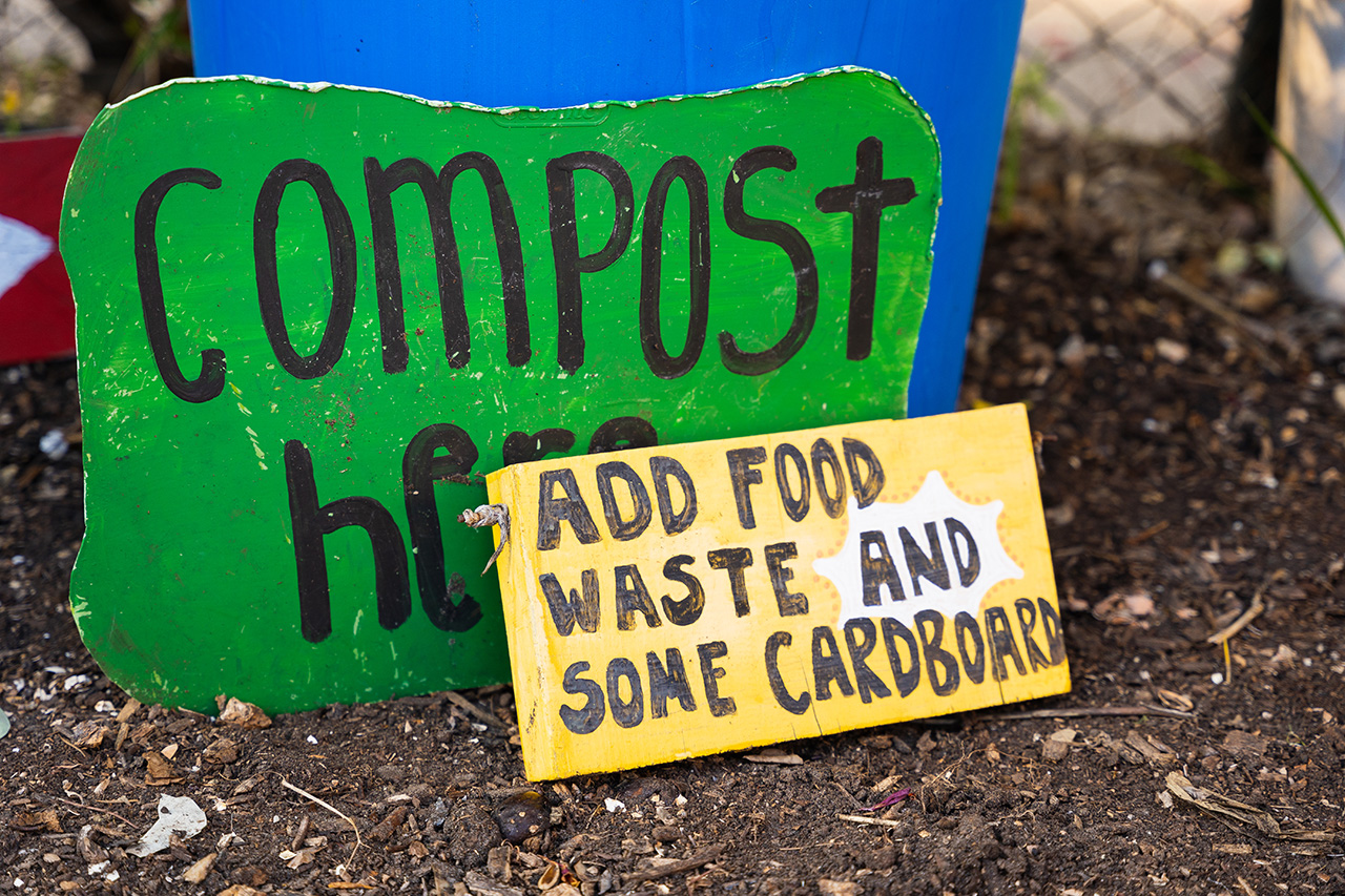 Students volunteer at the Warren Place Community Garden.