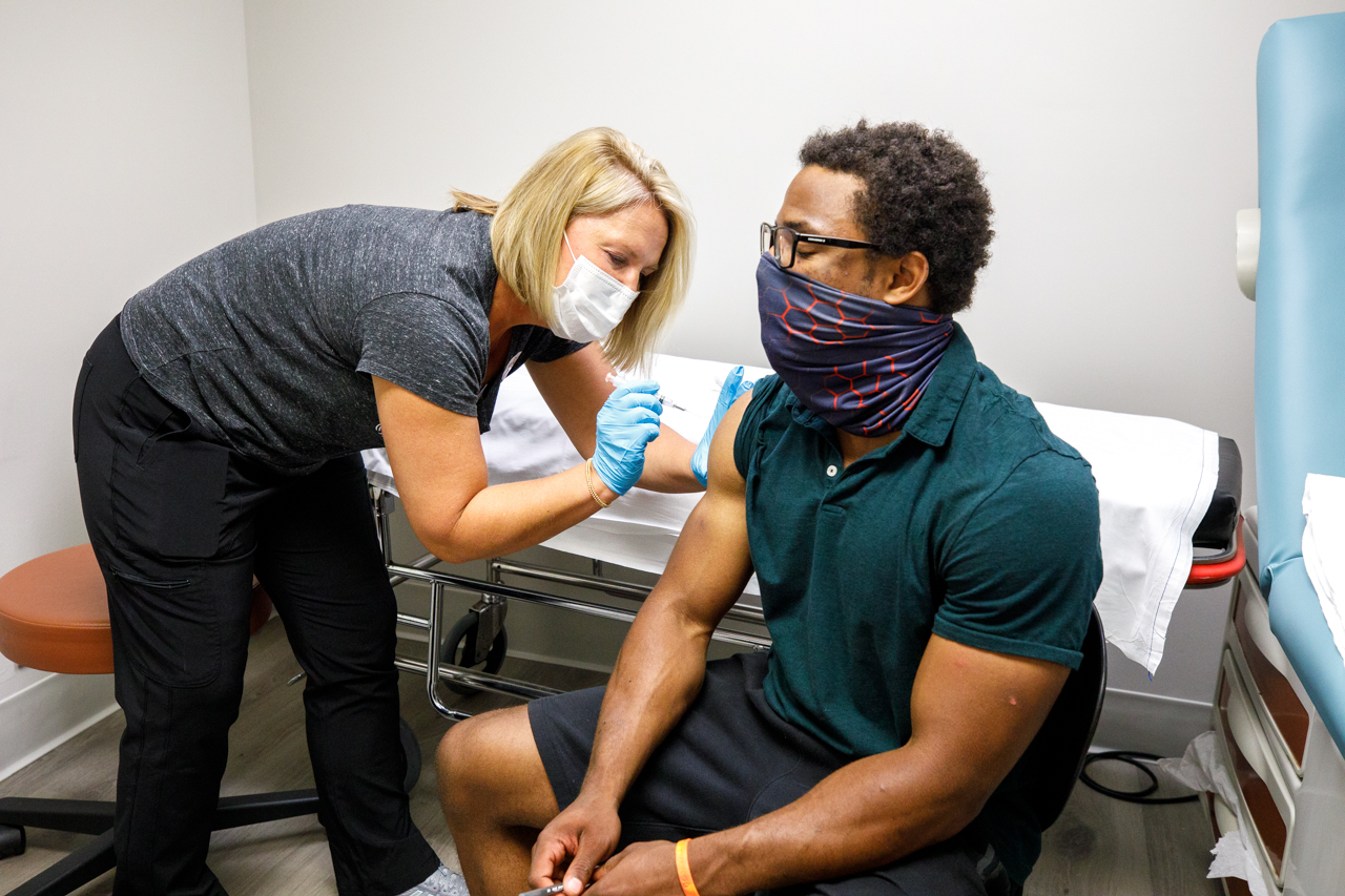 A CofC student gets the first of two shots of the Moderna COVID-19 Vaccine.