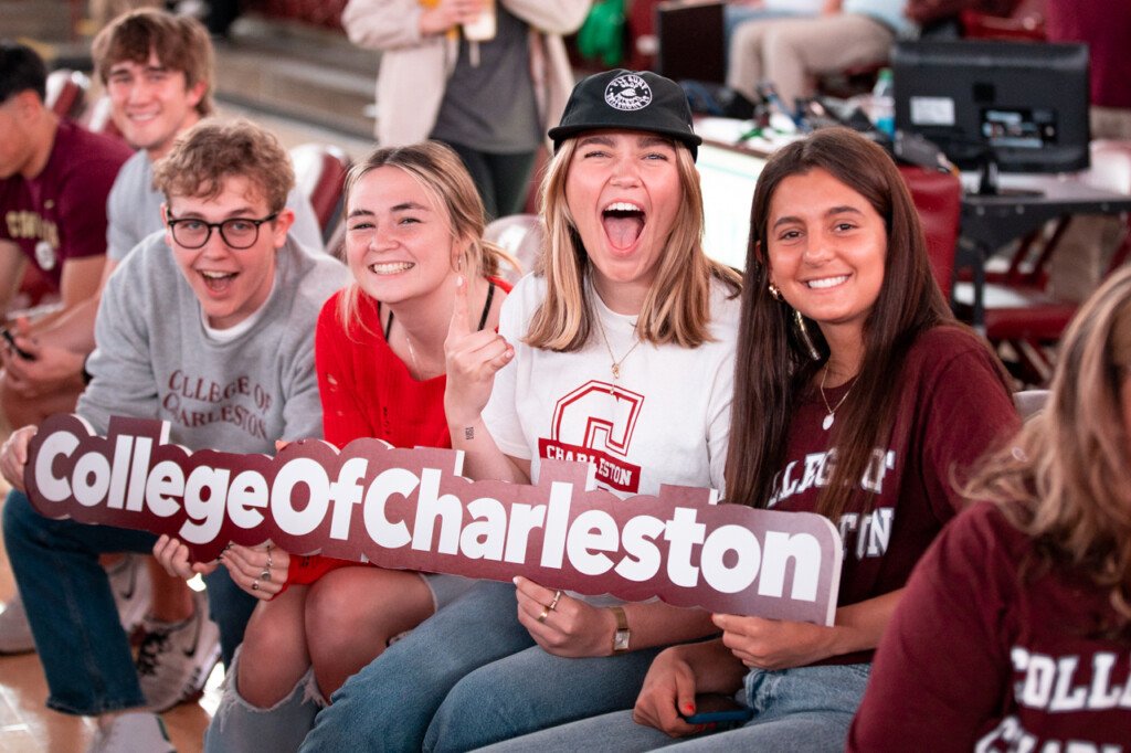 Excited students watching game