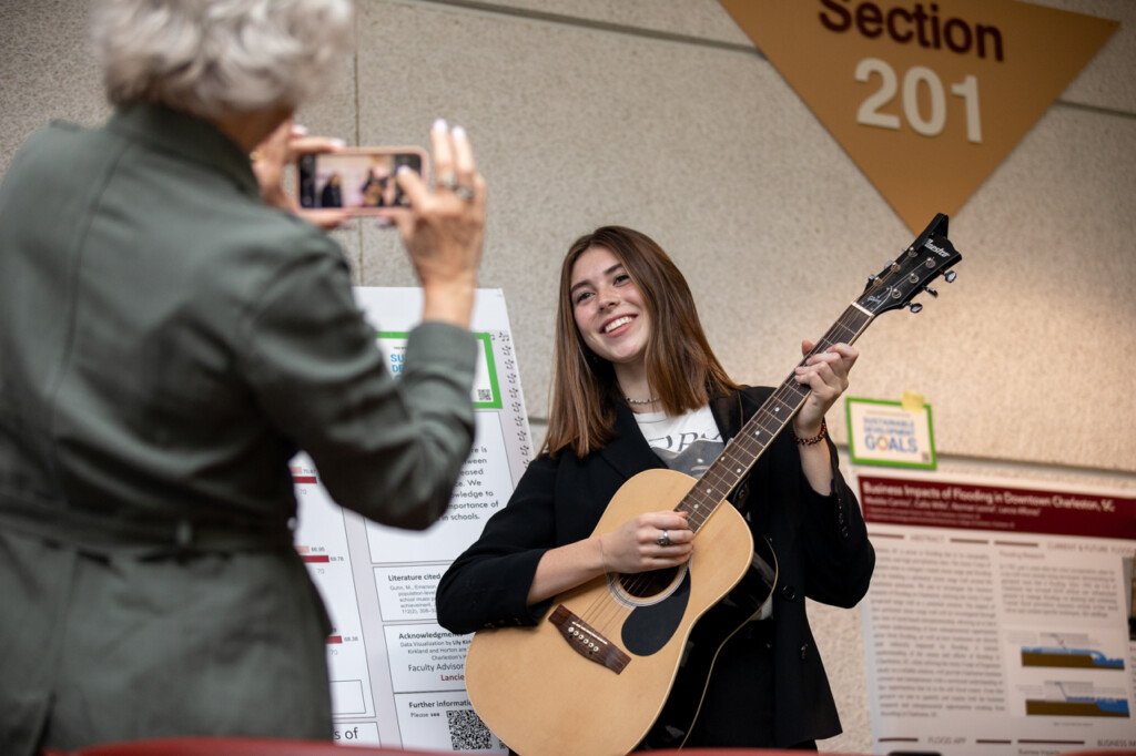 posing with guitar