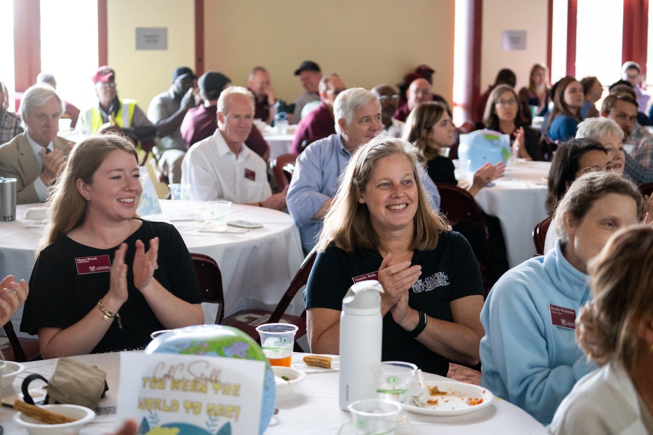 clapping for winners at Staff Award Luncheon