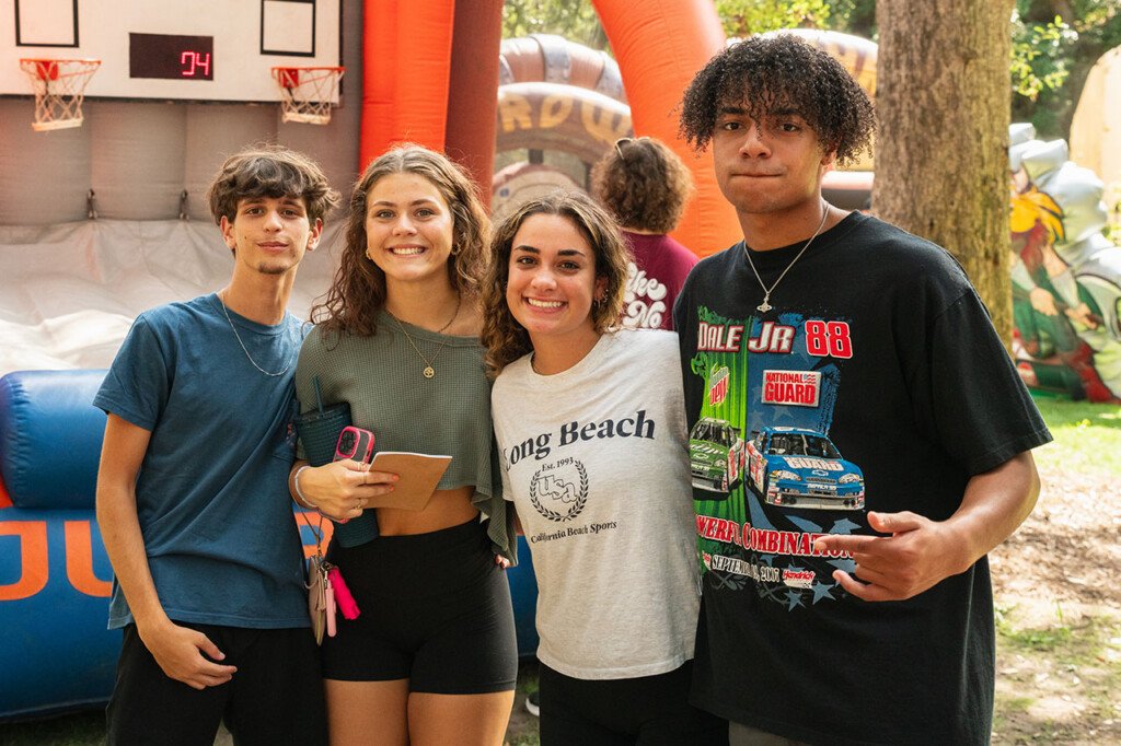 students in front of games