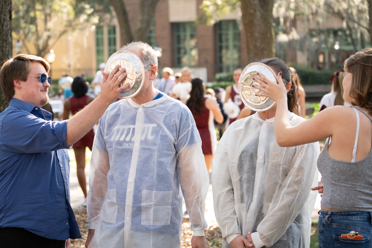 faculty getting pie in face to raise money for CofC day