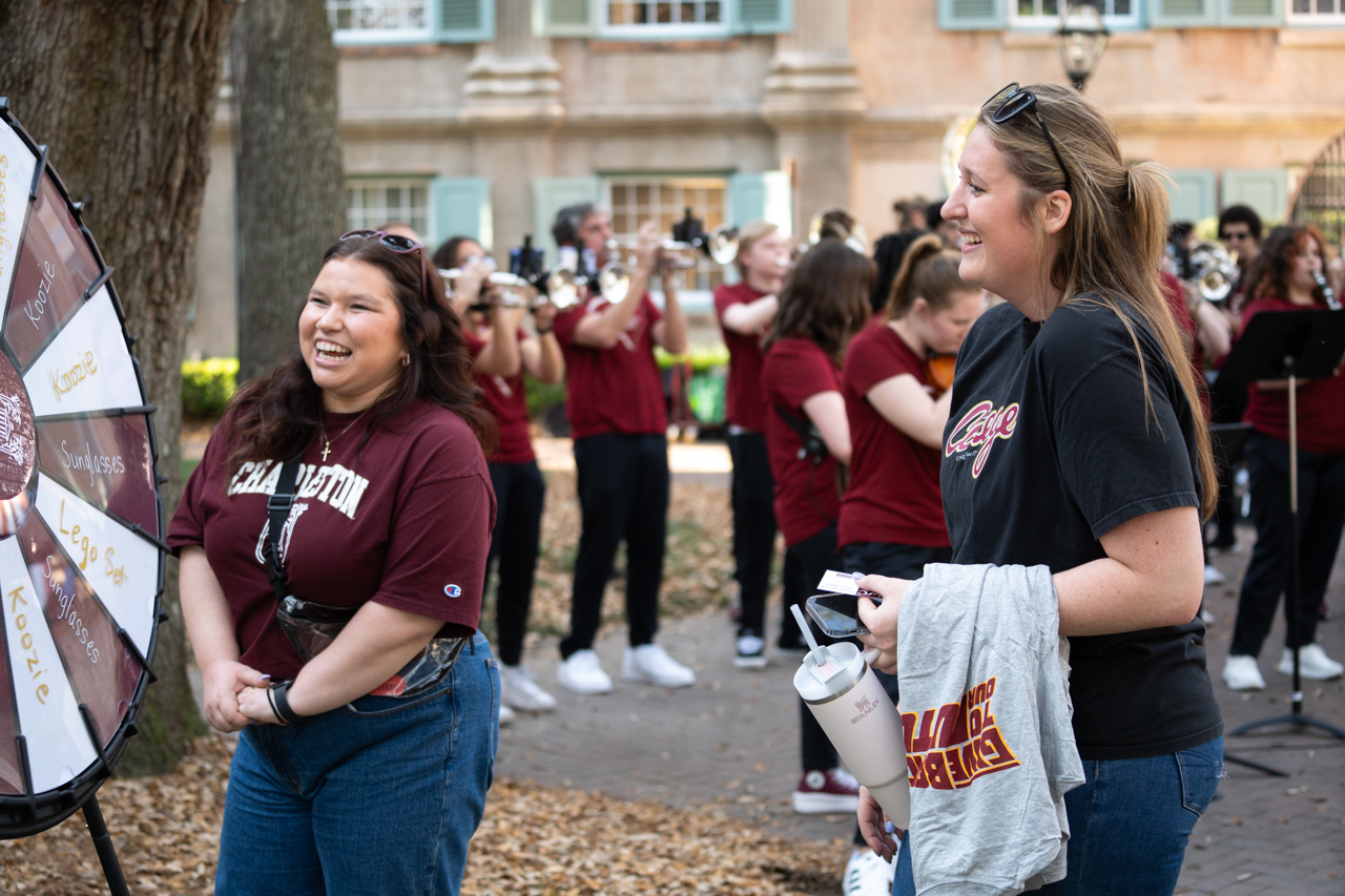 spinning the prize wheel at CofC day