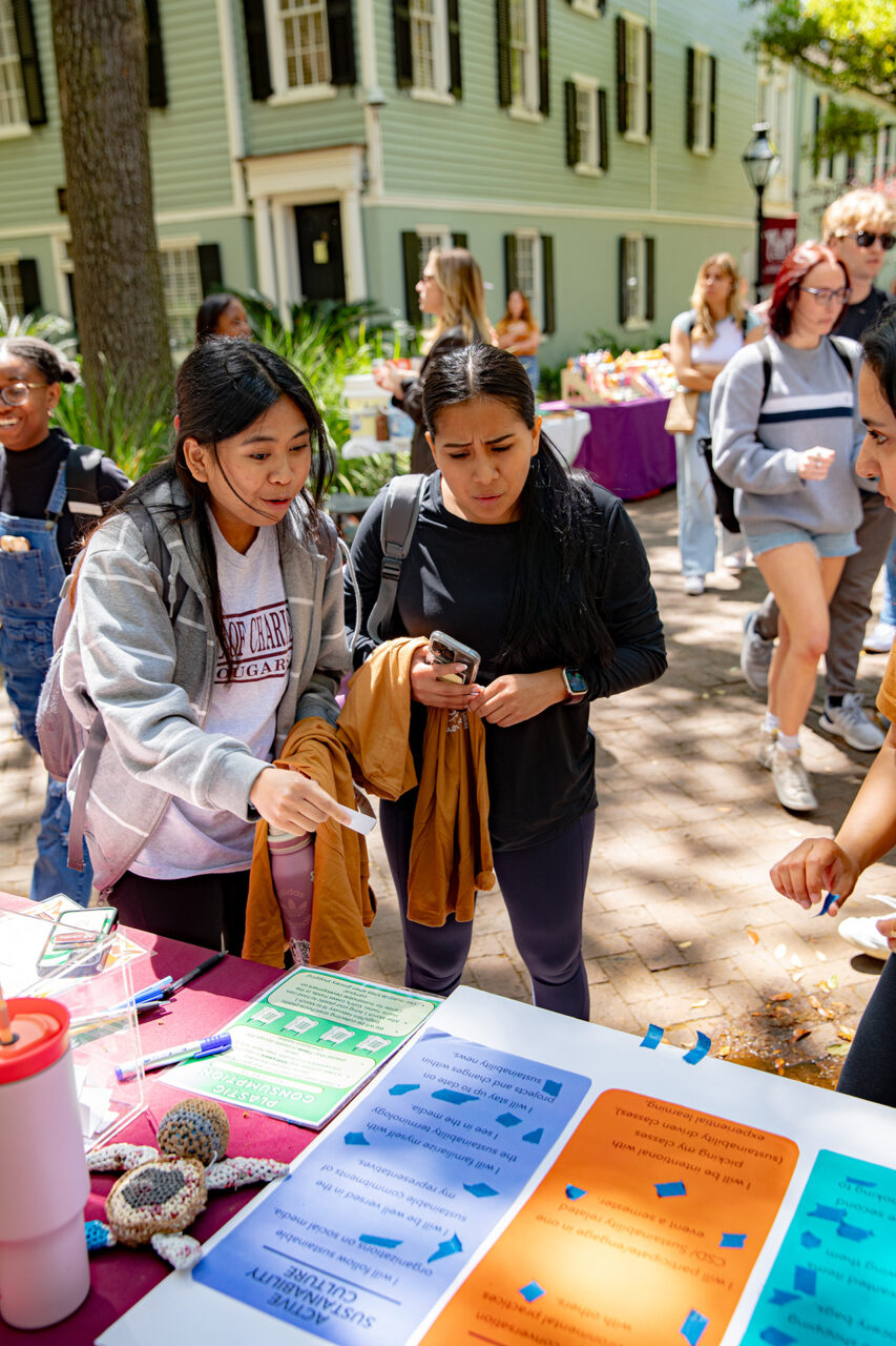 CofC students at Honors Engaged and Center for Sustainable Development booth at Sustainability Fair.