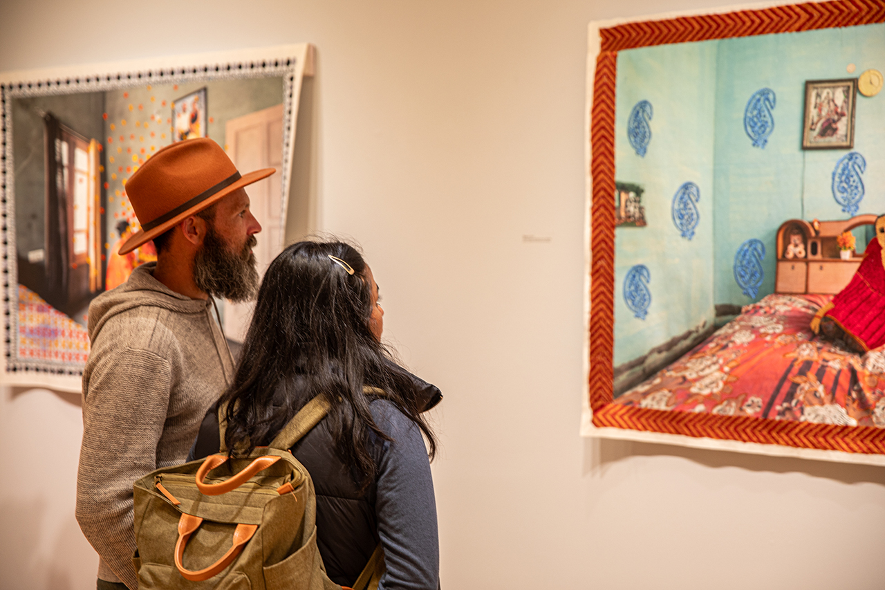 Halsey attendees admire Spandita Malik's exhibit titled Meshes of Resistance. 