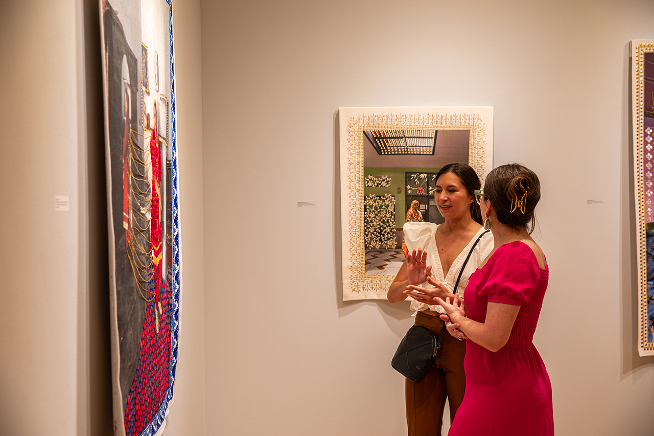 Halsey attendees admire Spandita Malik's exhibit titled Meshes of Resistance.