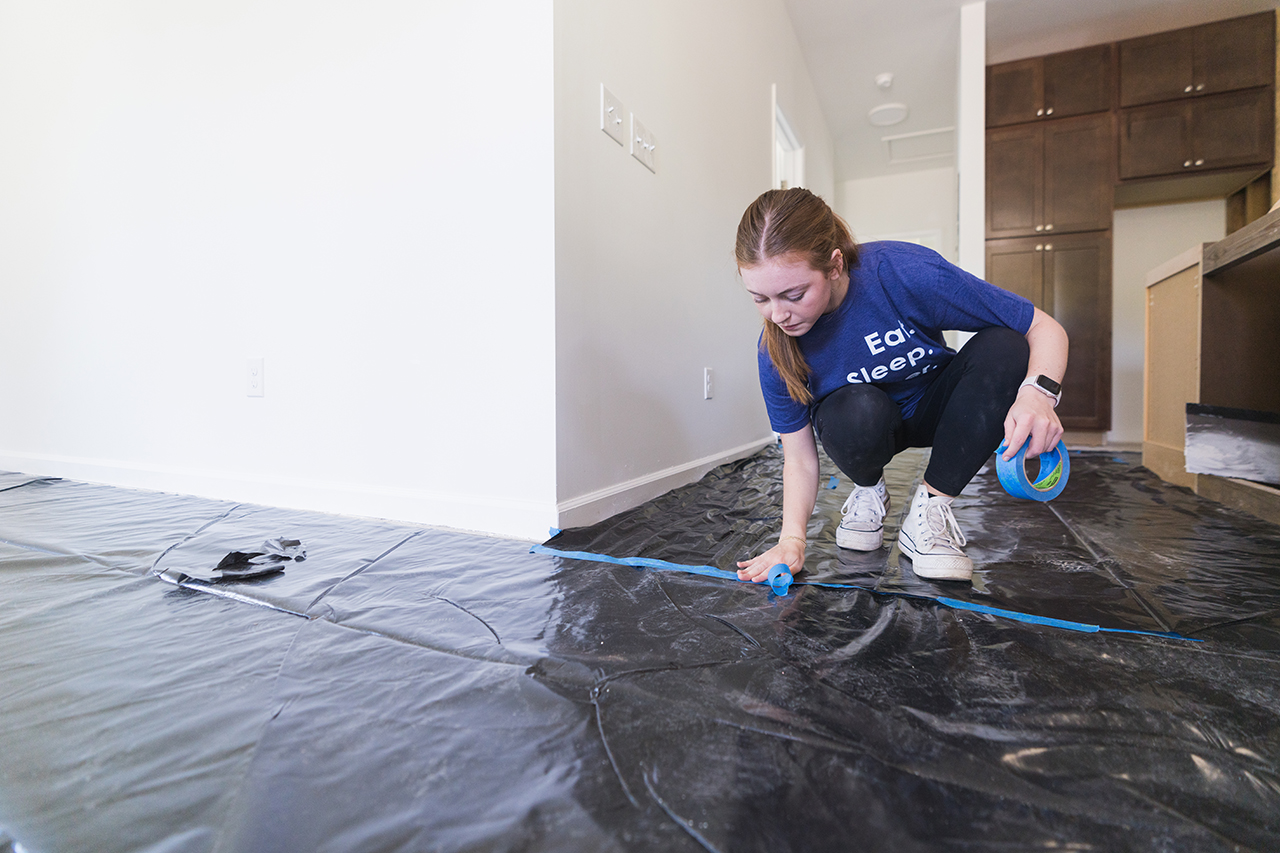 students work on a home for Habitat For Humanity in Charleston