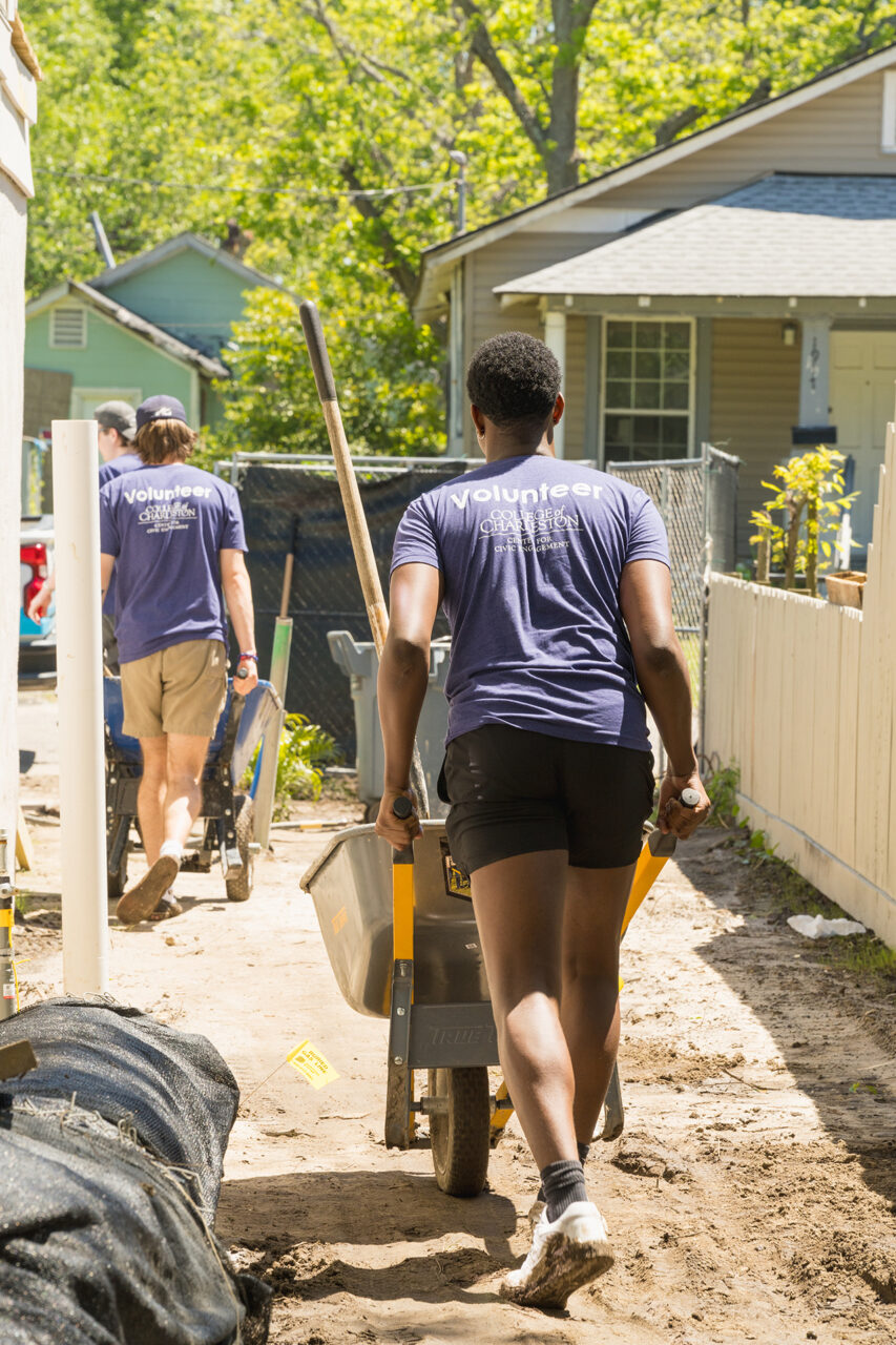 students work on a home for Habitat For Humanity in Charleston