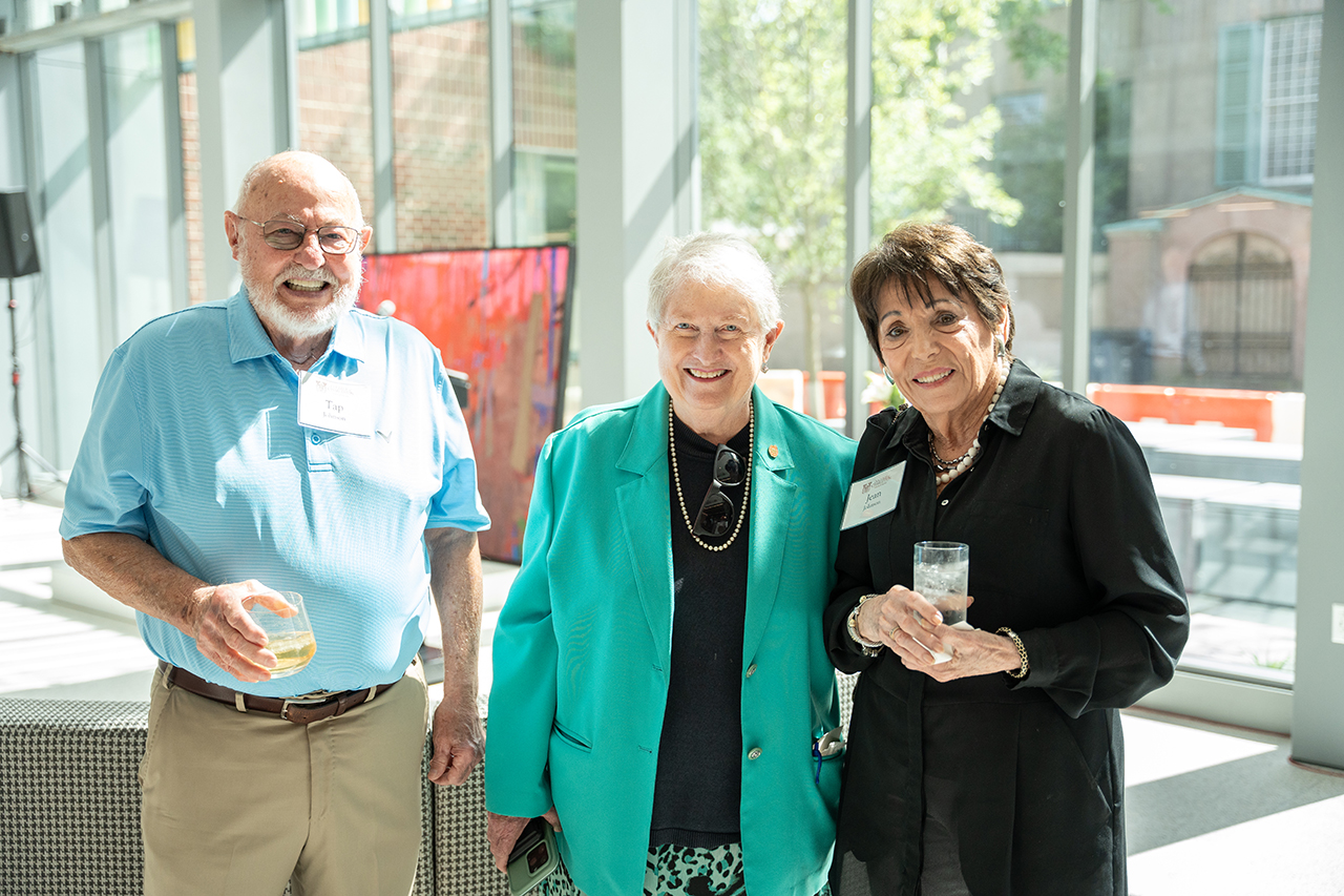 group poses at the Simons Center 