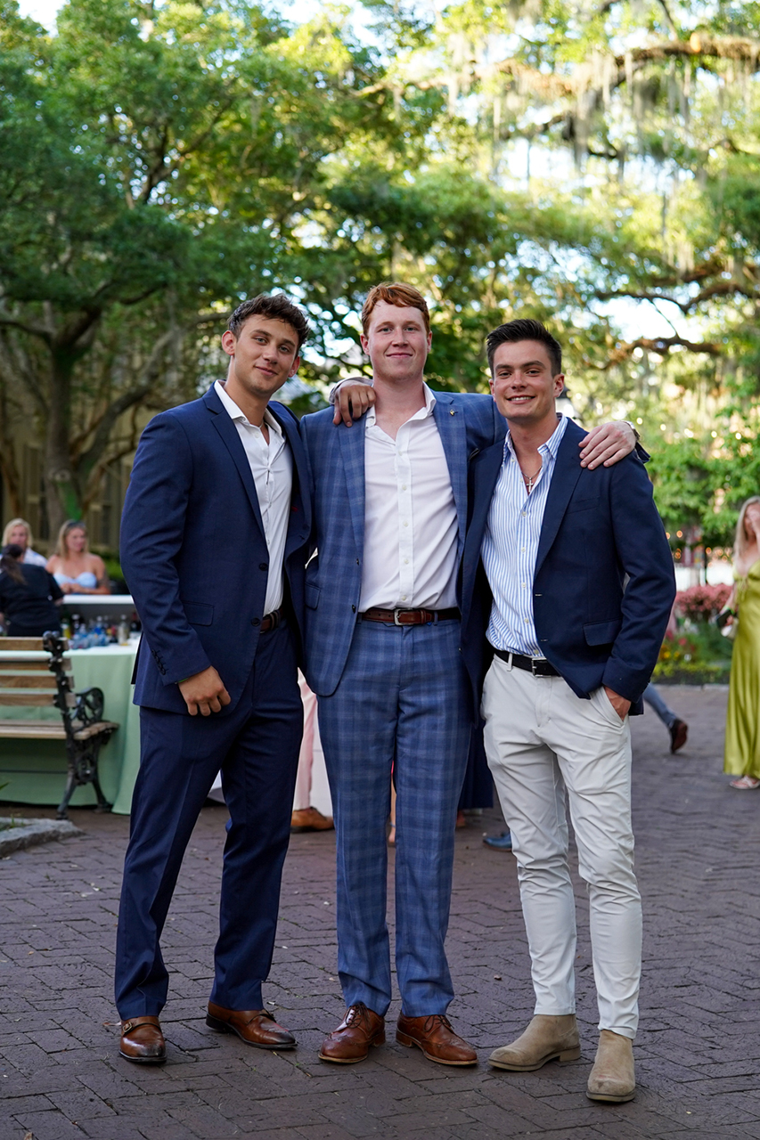 Alumni pose together at the Charleston Affair 