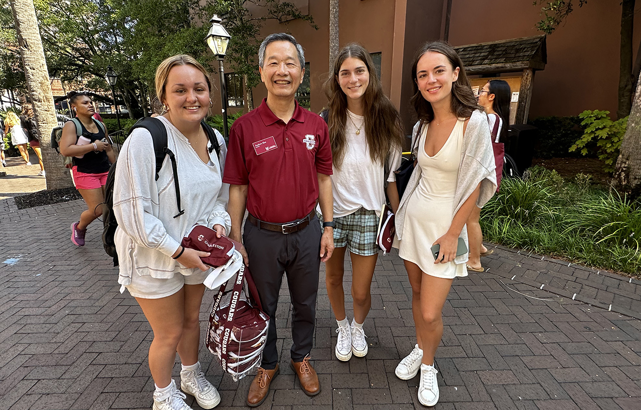 President Hsu hands out mini basketballs on campus 