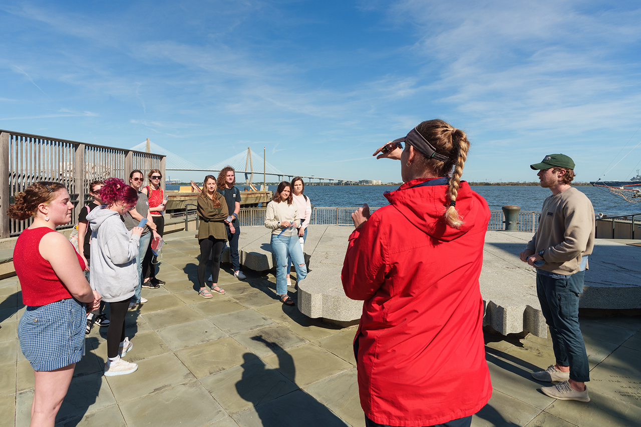 Marine biology students gather and process algae specimens in a