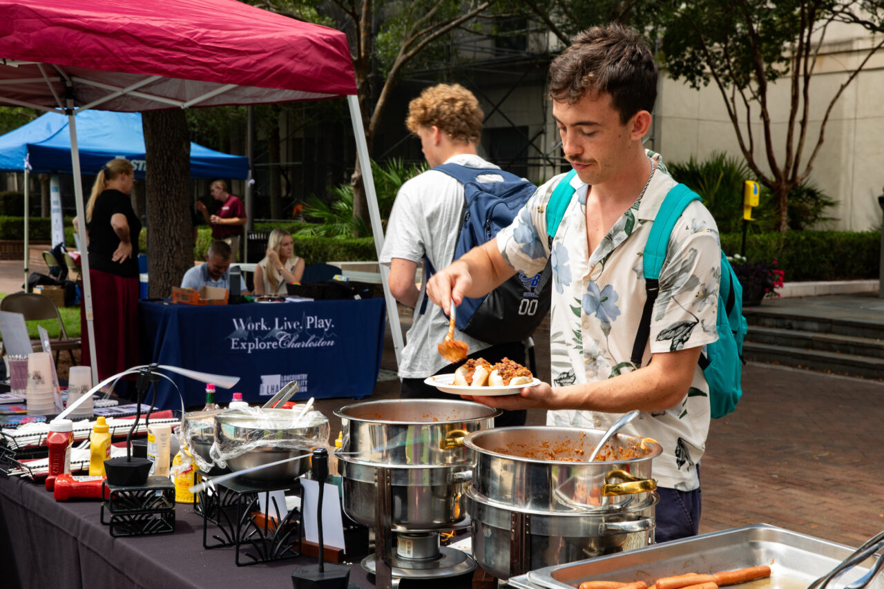 Students receive free food at Careers Cookout in Rivers Green.