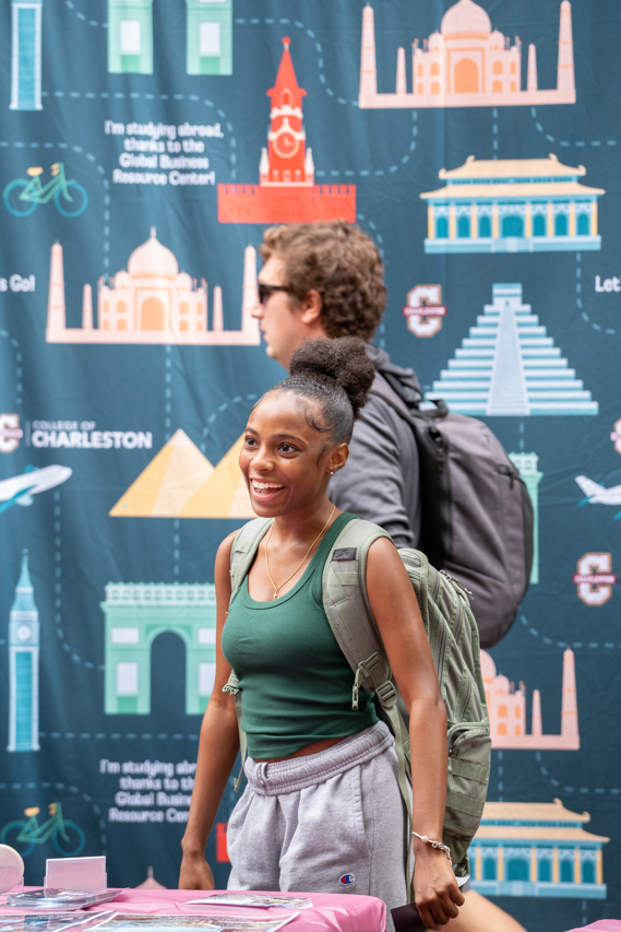 Student smiling at the Study Abroad Fair 