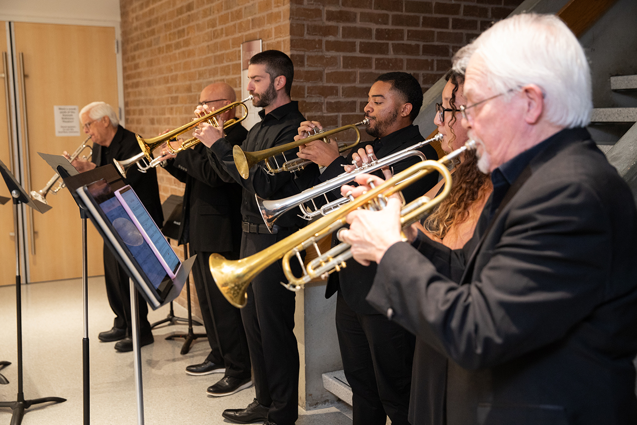 musicians play at opening