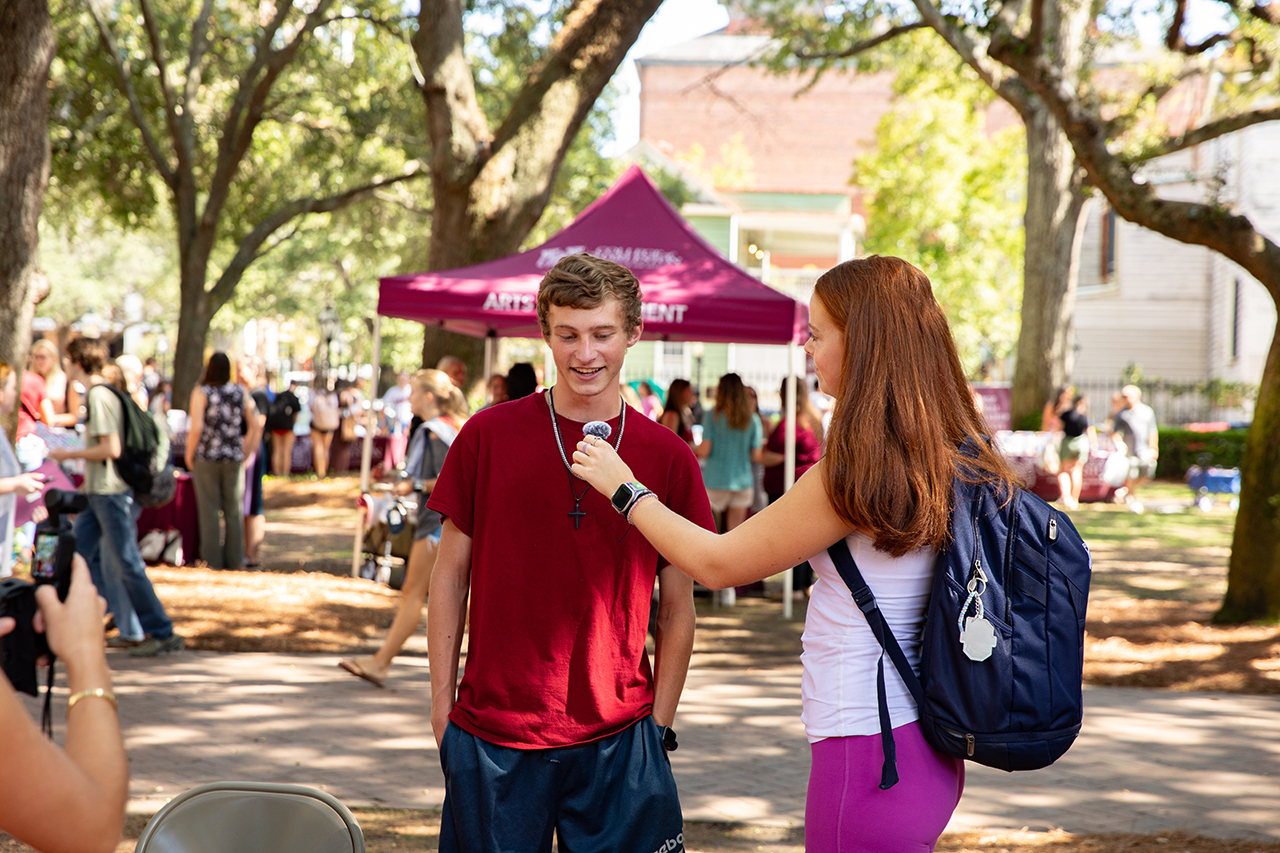 Student gets interviewed for CofC's instagram at Majors and Minors fair.