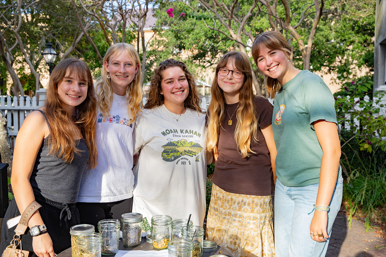 Students make personalized tea bags at Garden Work Day with locally grown herbs and dried plants.