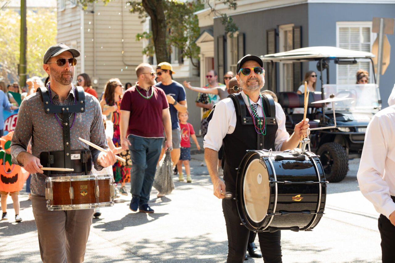 Halsey Art in Motion Parade featuring artist banners and local organizations and musicians.