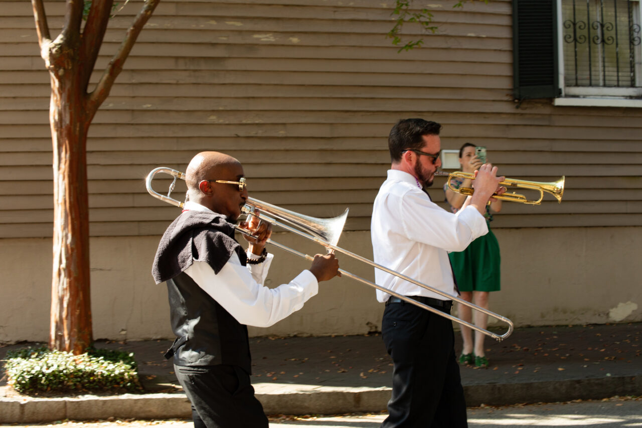 Halsey Art in Motion Parade featuring artist banners and local organizations and musicians.