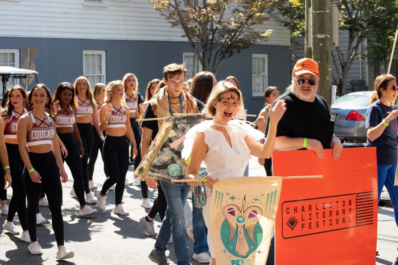 Halsey Art in Motion Parade featuring artist banners and local organizations and musicians.