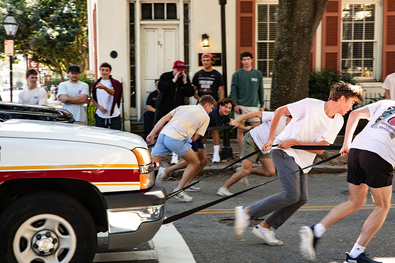 Members of the Pi Kappa Alpha Fraternity pull vehicles to raise money for their philanthropy.