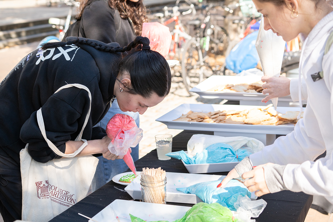 students make cookies during finals week for stress relief outside the library 