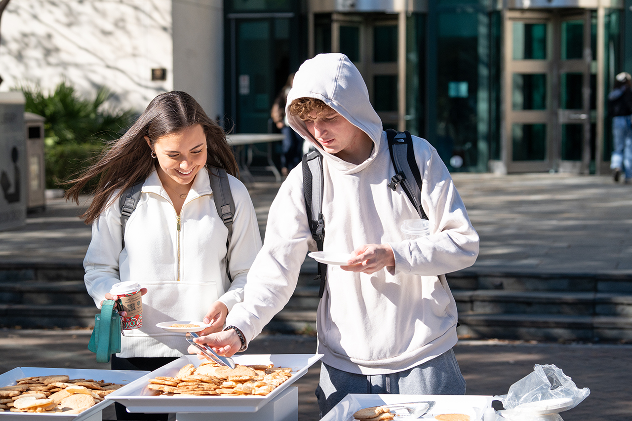 students make cookies during finals week for stress relief outside the library 