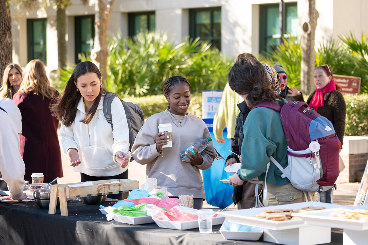 students make cookies during finals week for stress relief outside the library 