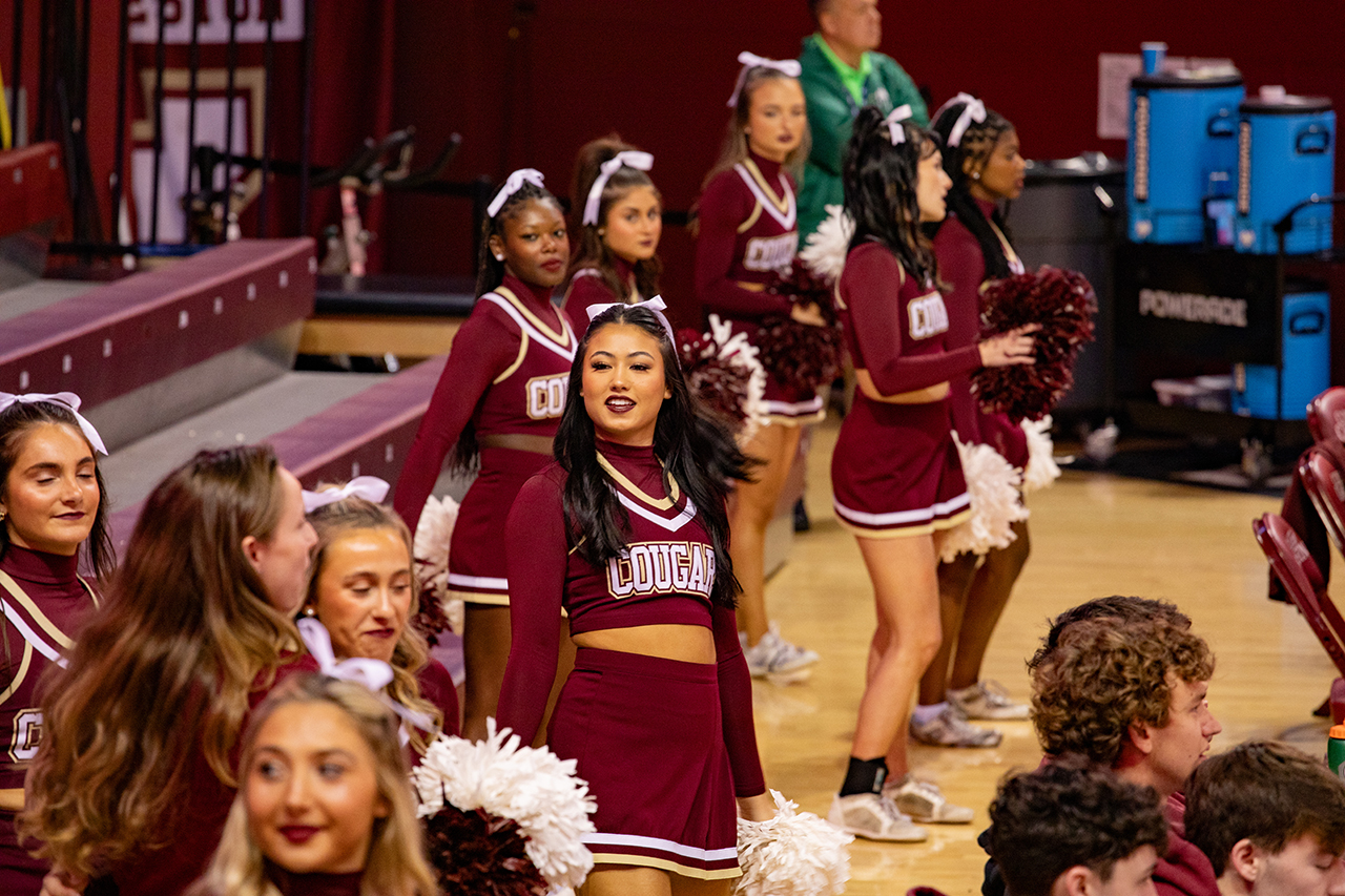 CofC's Cheer Team cheer on the women's basketball team at their home game in TD Arena.