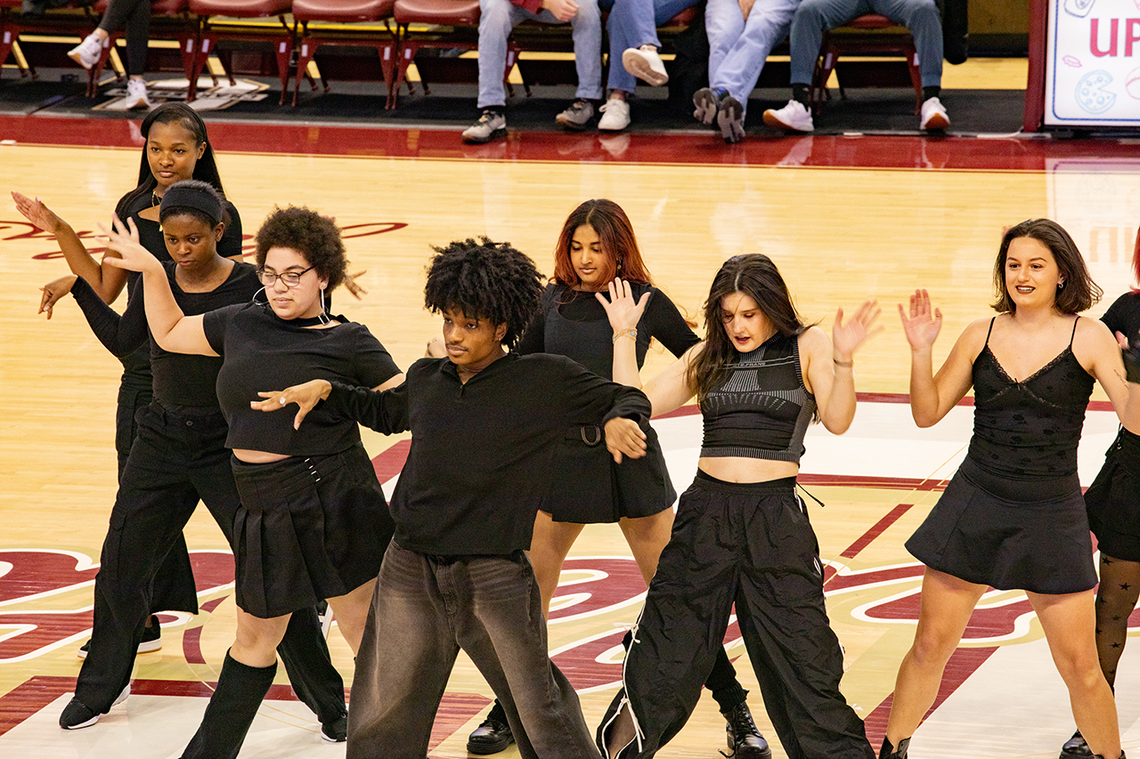 CofC's K-pop dance group perform at the women's basketball game halftime.