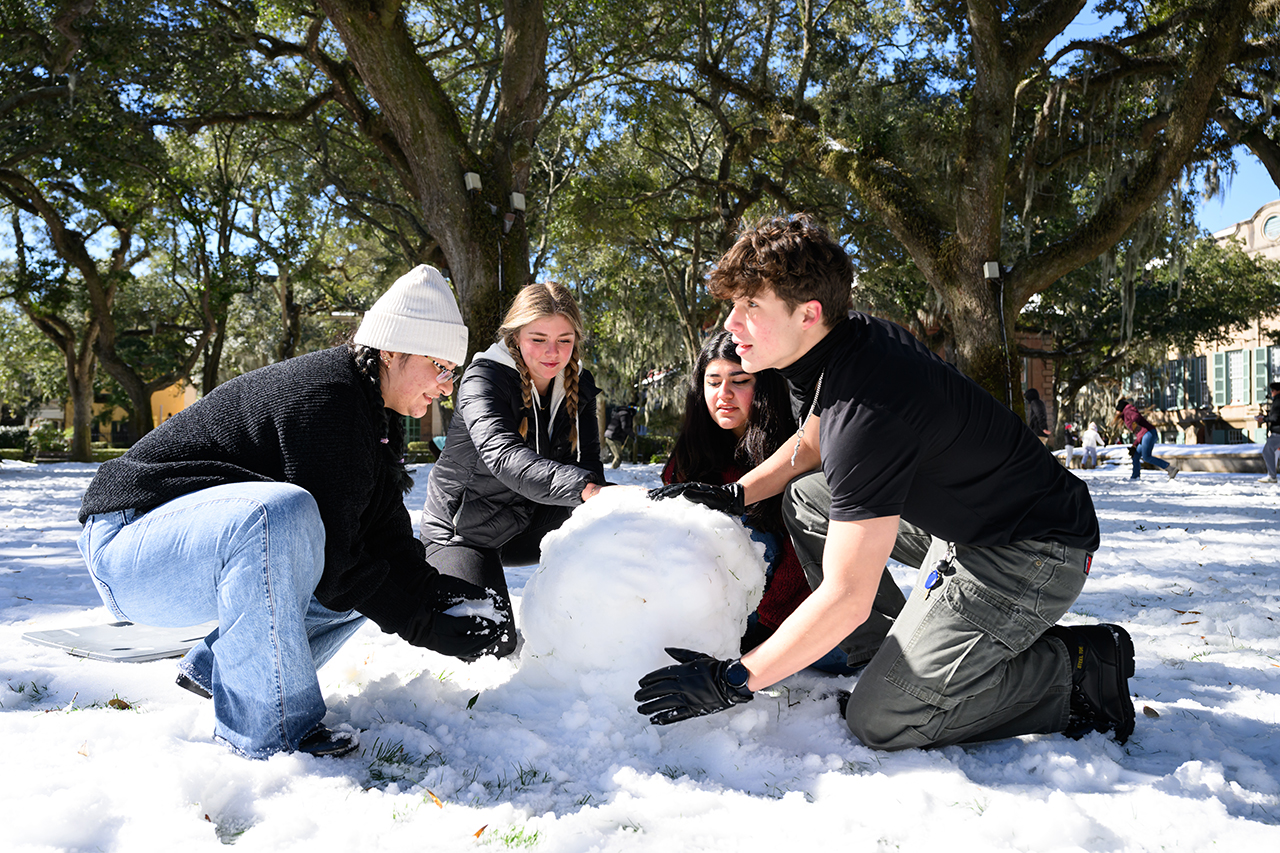 Students Build a Snowman in the Cistern Yard 