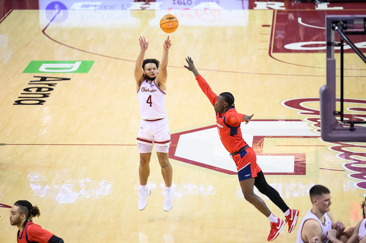 taking a shot at the men's basketball game 