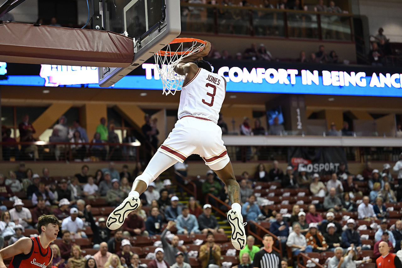 College of Charleston mens basketball team dunks the ball