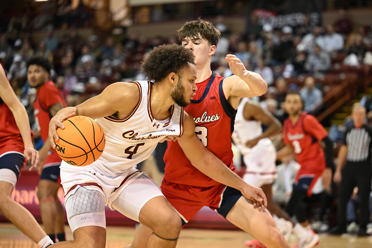 playing offense at the Men's Basketball game 