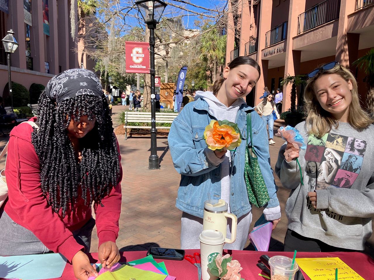 Students stopped by to make dozens of tissue flowers and assembled them into bouquets to share with Respite Care Charleston caregivers on National Caregivers Day