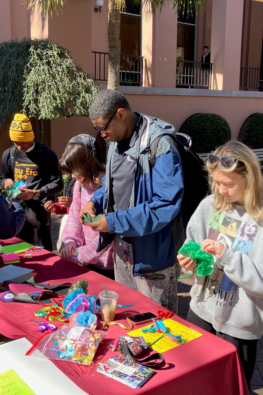 Students stopped by to make dozens of tissue flowers and assembled them into bouquets to share with Respite Care Charleston caregivers on National Caregivers Day