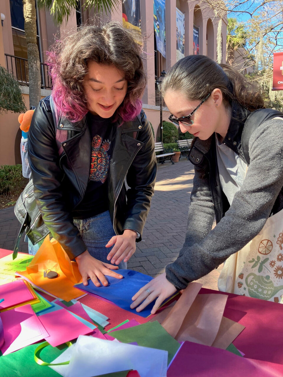 Students stopped by to make dozens of tissue flowers and assembled them into bouquets to share with Respite Care Charleston caregivers on National Caregivers Day