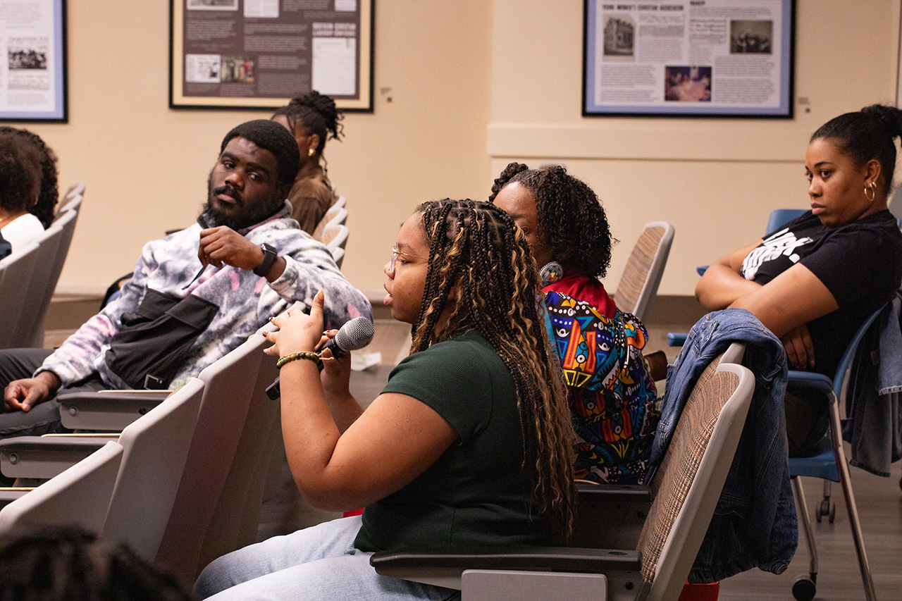 Students, faculty, staff, and other community partners gather to speak about the experiences of Black people at CofC at State of Black Summit in Septima Clark Auditorium.