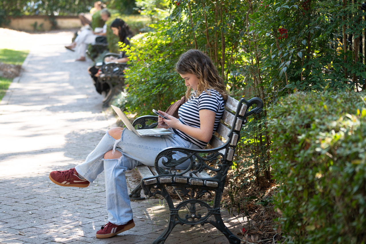 reading on a bench 