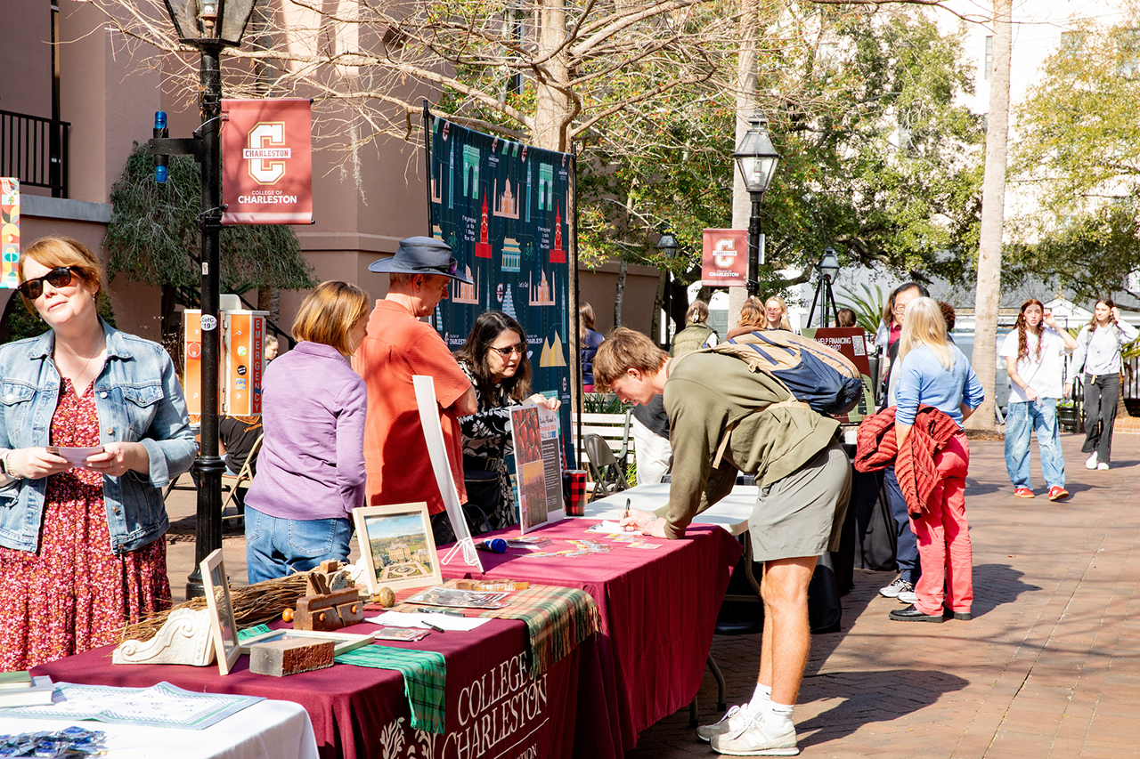 Students explore the study abroad fair in Cougar Mall.