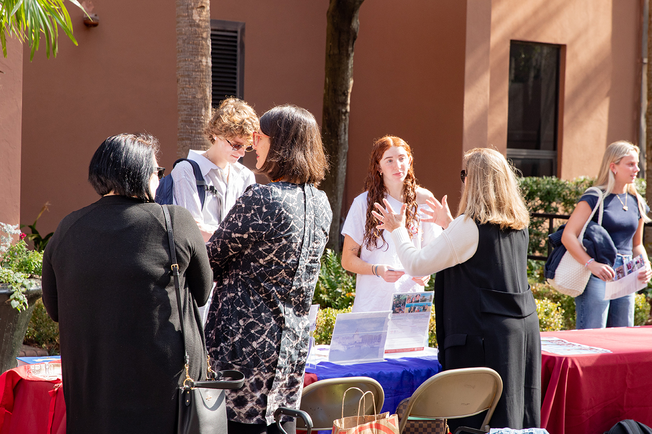 Students explore the study abroad fair in Cougar Mall.