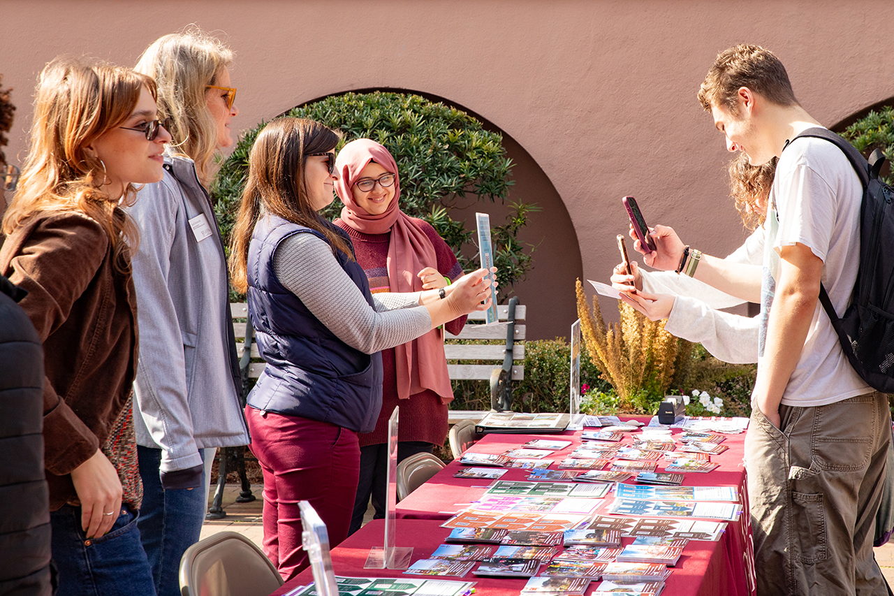 Students explore the study abroad fair in Cougar Mall.