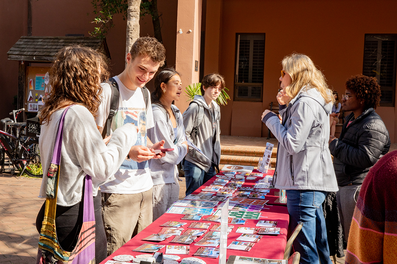 Students explore the study abroad fair in Cougar Mall.