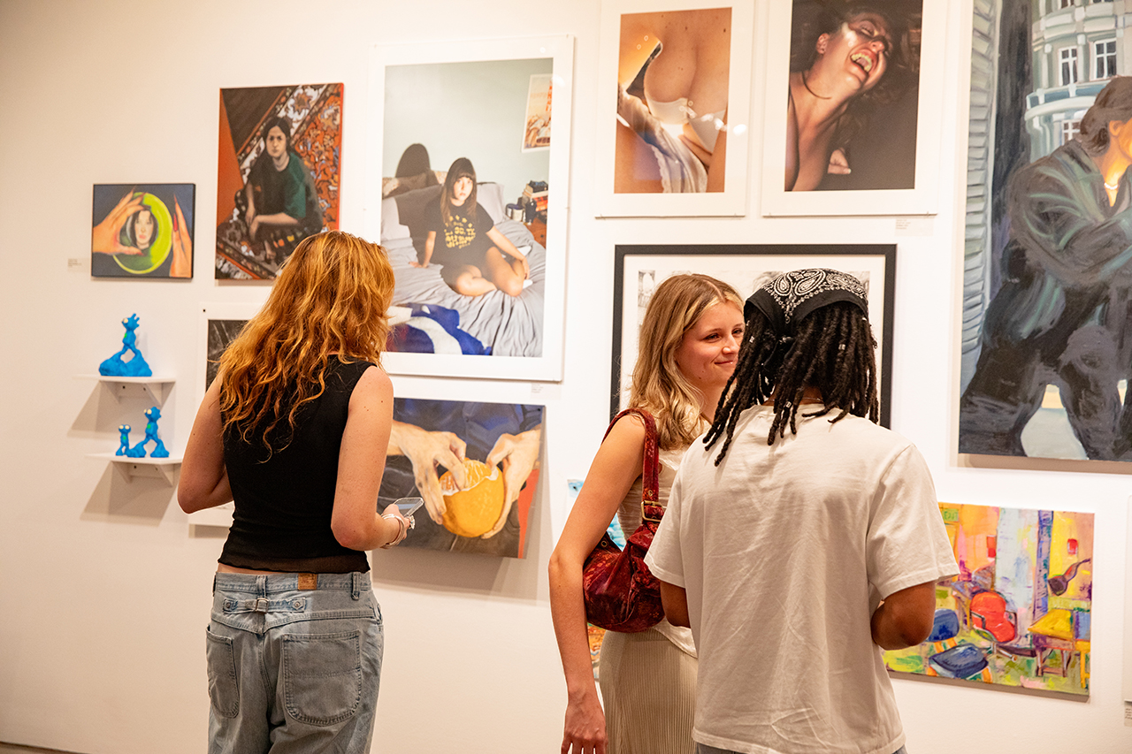 Talented CofC students are recognized at Halsey's Young Contemporaries Exhibit. Recognized students are joined by their friends and families as they look over awarded art works.