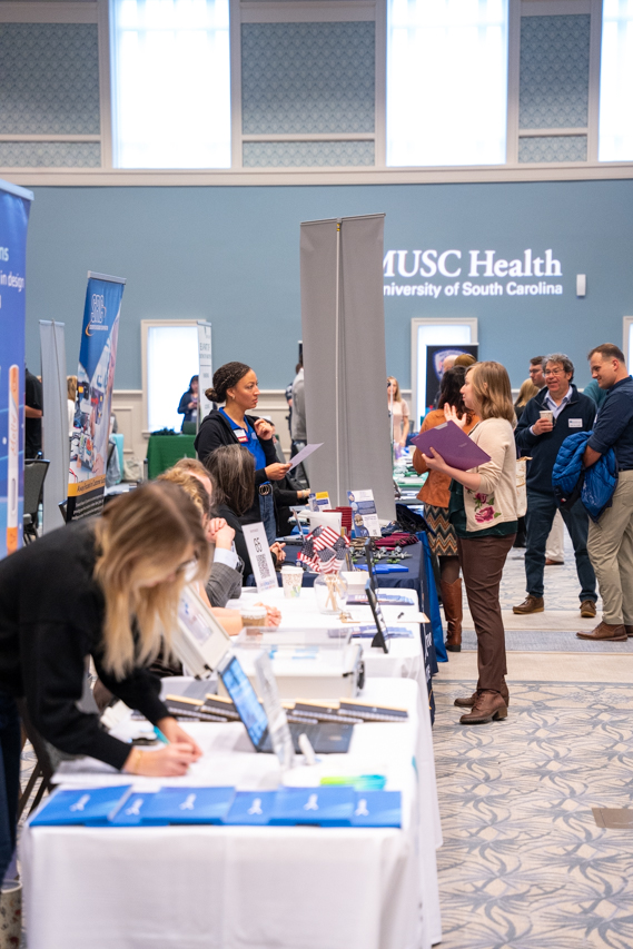 students attend the College of Charleston Career Expo in the Gillard Center 