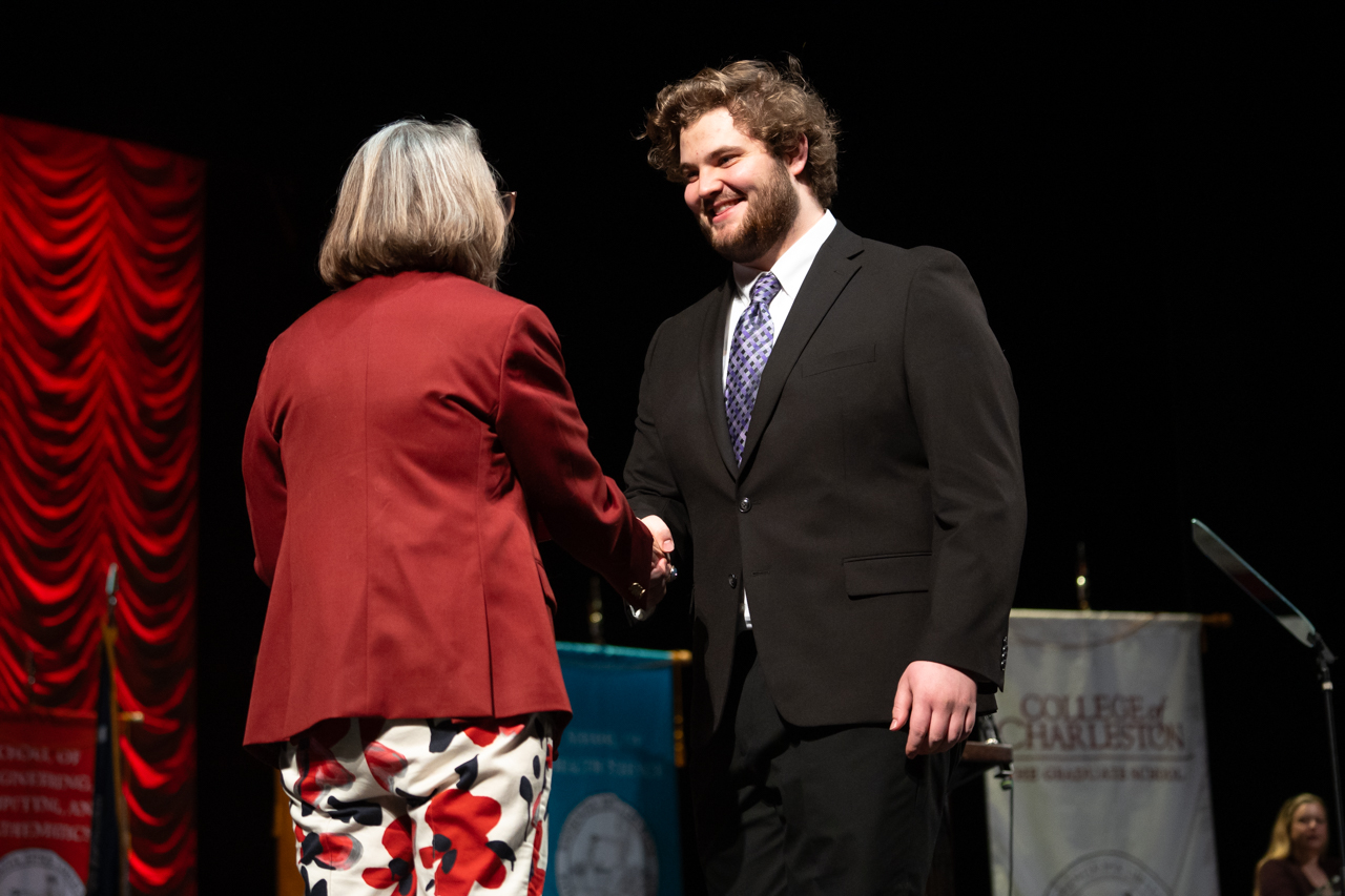 student receives ring before graduation at the Sottile Theater 