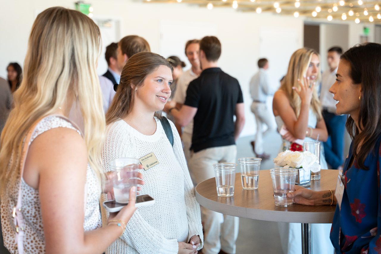 MBA Students network at MBA Appreciation event at the Harbor Club in Charleston