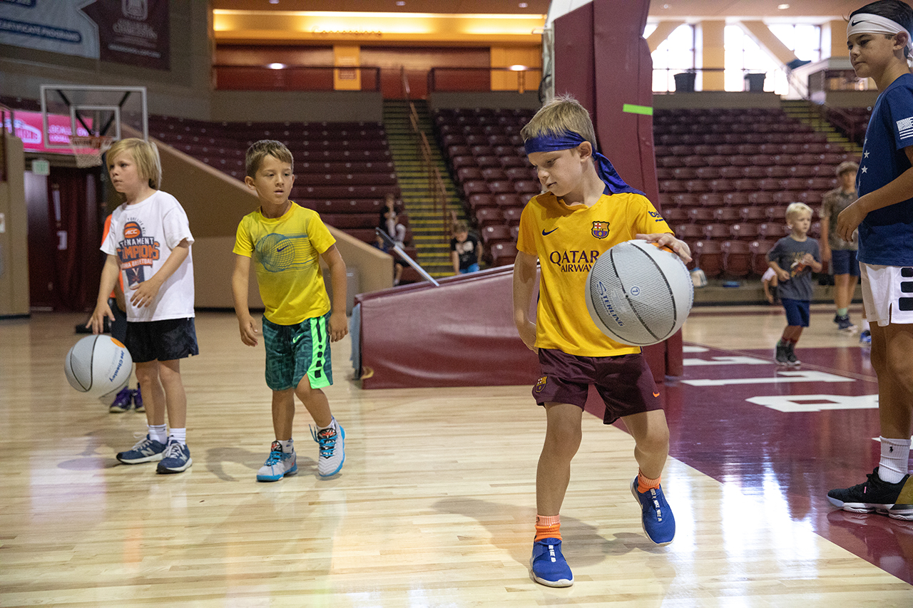 children playing basketball